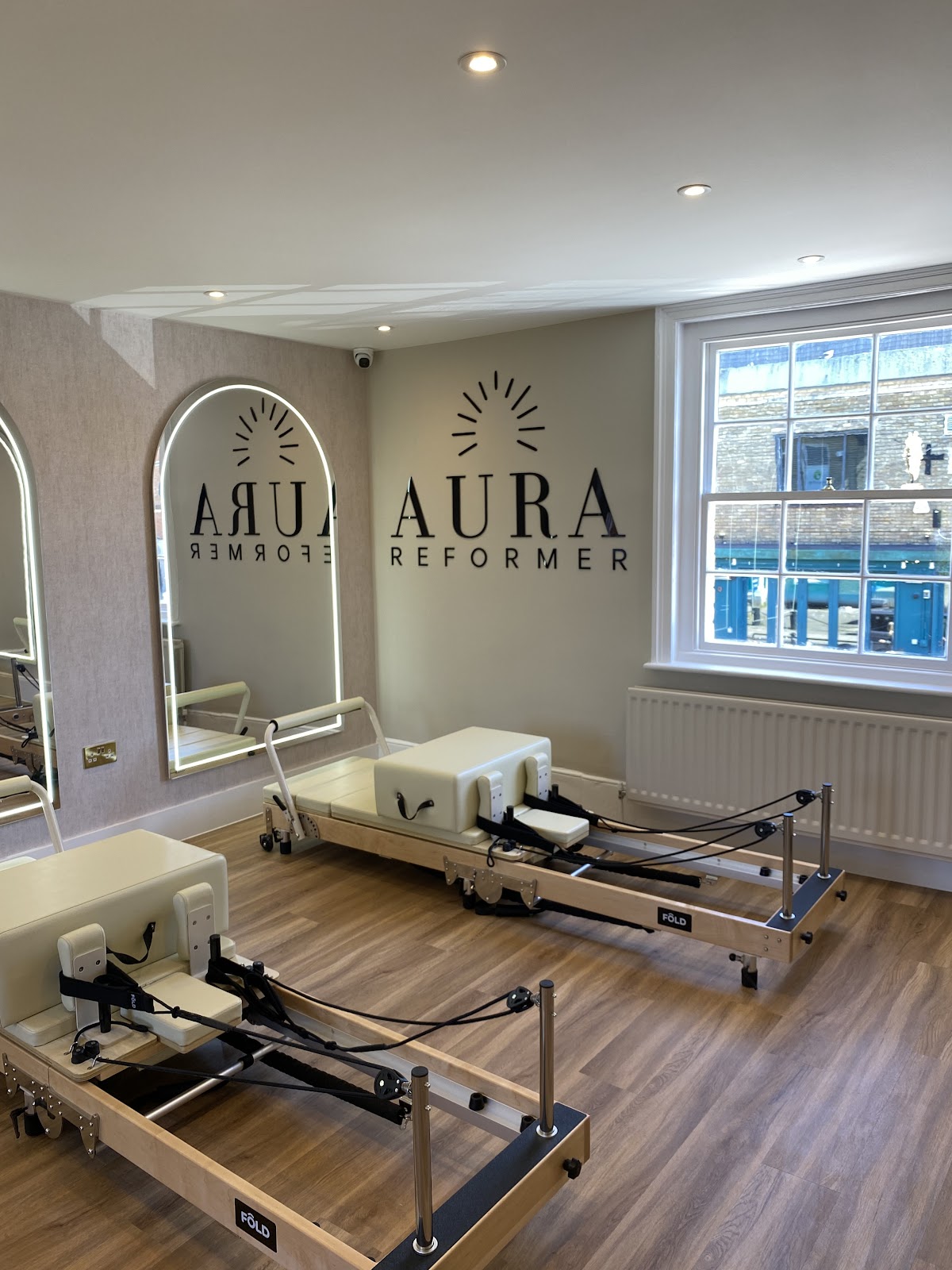 Aura Tanning and Wellness Lounge & Aura Reformer - Photo 2