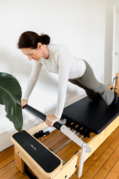 FlowHer Pilates
